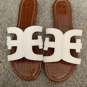 White sandals from Amazon.  Never worn